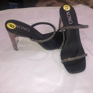 Clear heel with rhinestone straps. Size 9 new with tags